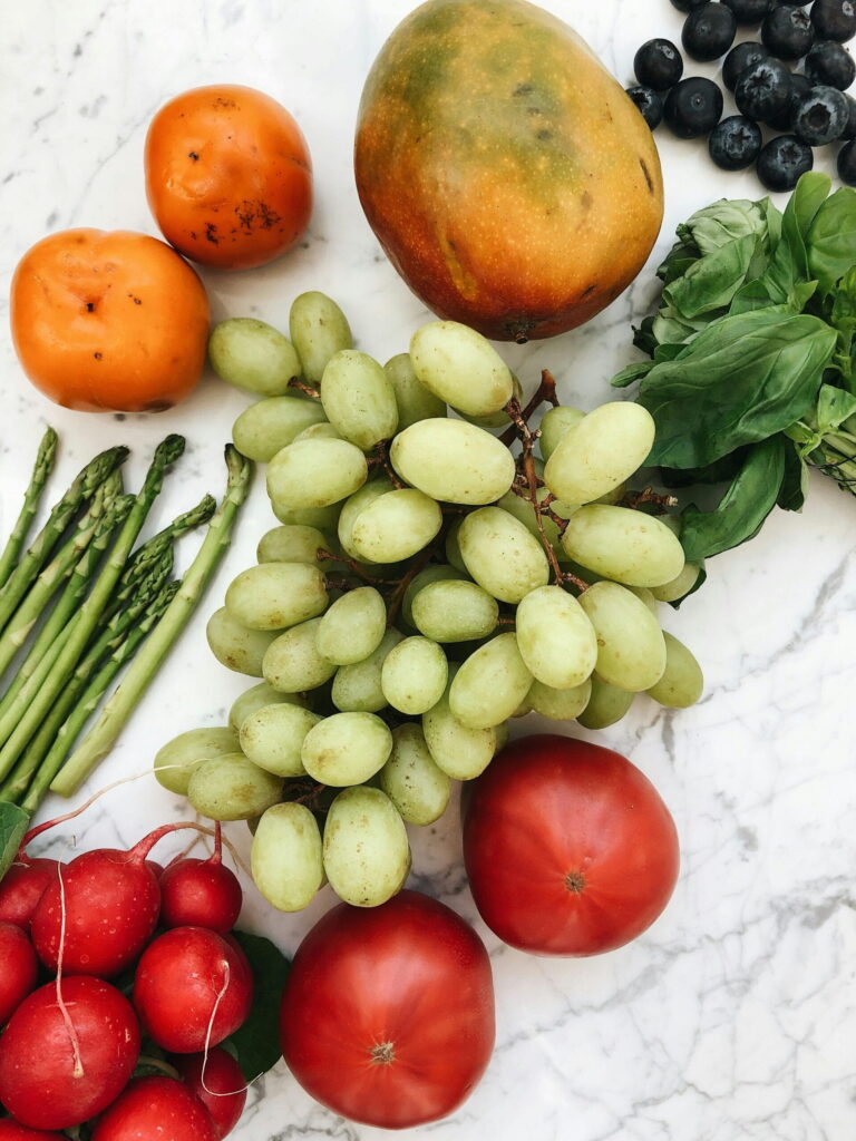 Fresh fruit and vegetables as a symbol of self-care, energy, and embodied support