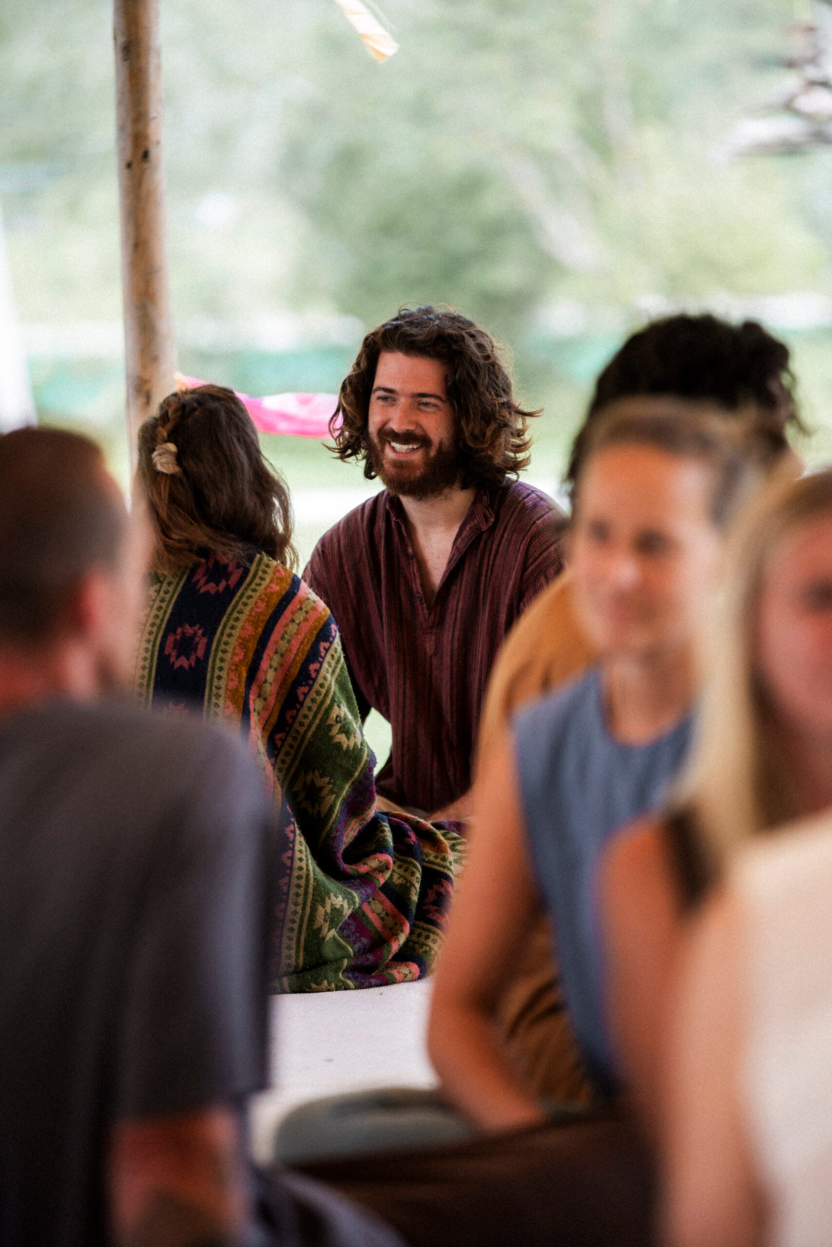 Man smiles in Tantra workshop after vulnarable share